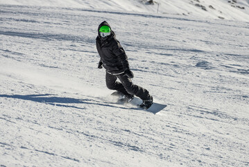 Freeride powder, snowboarding in Les deux alpes resort in winter, mountains in French alps, Rhone...