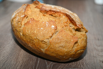 homemade freshly baked bread on a wooden table 18