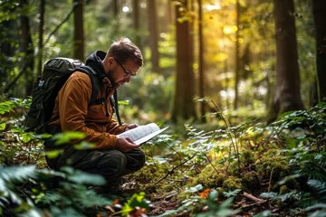 Fototapeten An environmental conservation surveyor in the forest, diligently recording data as part of field research, showcasing commitment to preserving nature and sustainability, Generative AI © Imagery Innovators