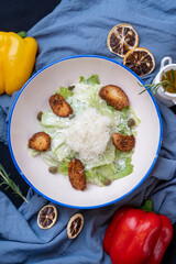 Caesar salad bowl with parmesan cheese
