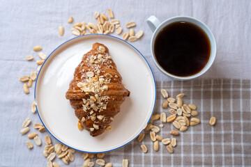 peanut croissant served with coffee