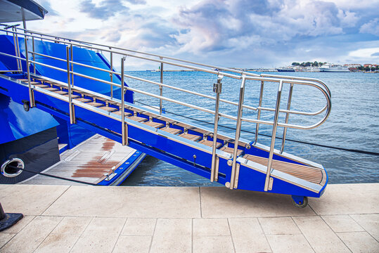 Gangway of a yacht or ship on the pier.
