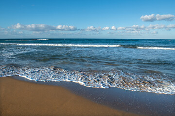 Cyprus Alagadi Turtle Beach.
View from the beach to the sea. Magnificent beach, sea and blue cloudy sky.