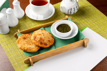 Fried bread cakes with sesame seeds and soy sauce.