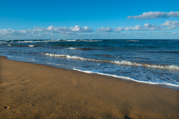 Cyprus Alagadi Turtle Beach.
View from the beach to the sea. Magnificent beach, sea and blue cloudy sky.