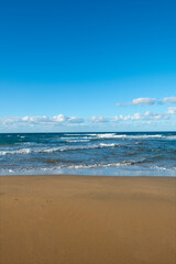 Cyprus Alagadi Turtle Beach.
View from the beach to the sea. Magnificent beach, sea and blue cloudy sky.