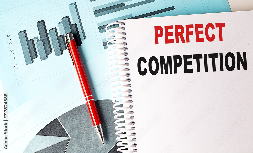 Poster perfect competition text on a notebook with pen on a chart background