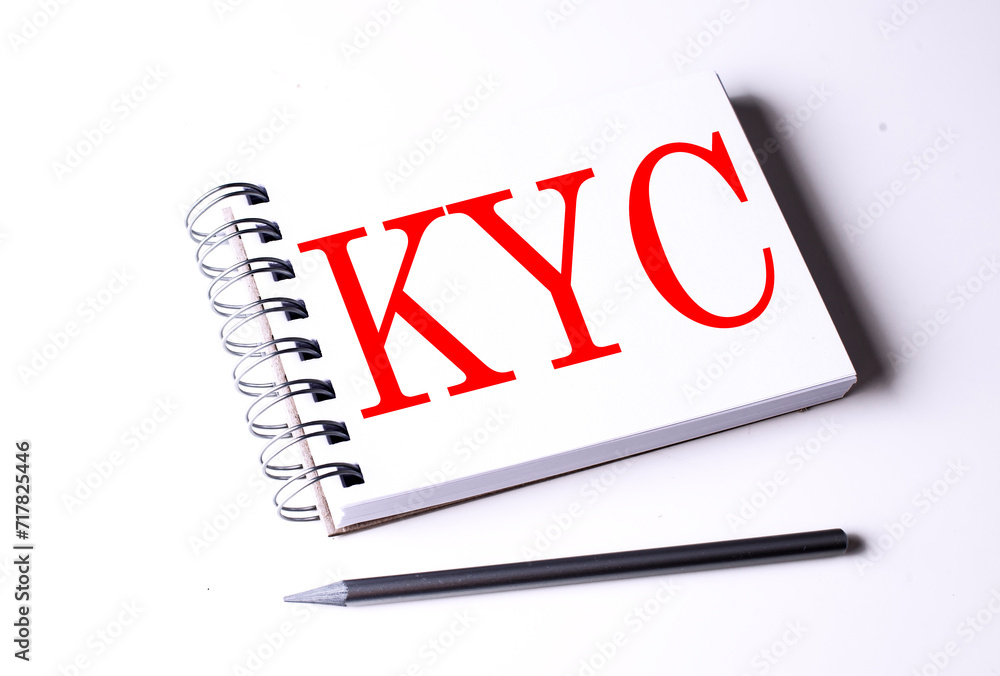 Poster text kyc on notebook on the white background