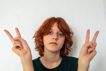  portrait of a beautiful teenage girl with a stylish short anime hairstyle on a light background