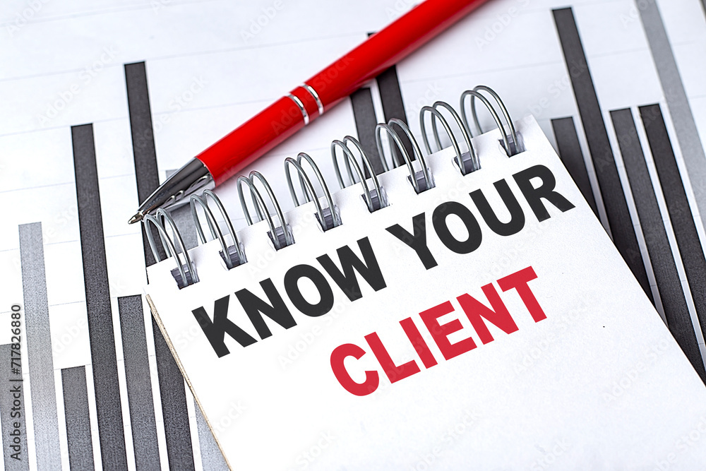 Poster know your client text written on notebook with pen on chart