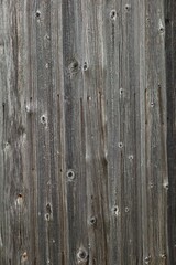 Closeup of planks of old weathered wooden wall.