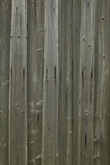 Closeup of planks of old weathered wooden wall.