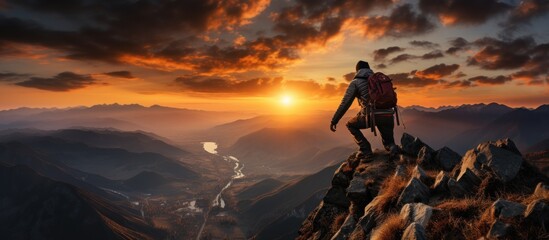young man Climber on sunset - obrazy, fototapety, plakaty