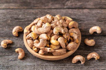 roasted salted cashew nuts on table.