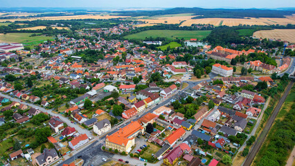 Aerial view around the old town and monastery Chotesov  in the czech republic on a cloudy day in late Spring