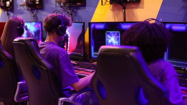 gamers multiracial online playmates back to back high five