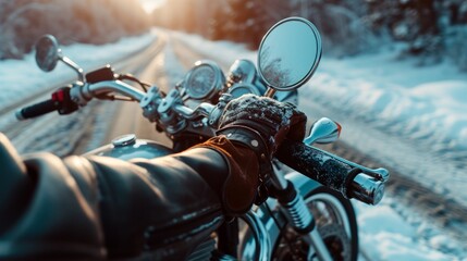 Hand in glove on motorcycle handlebar in winter, free space for insertion - obrazy, fototapety, plakaty