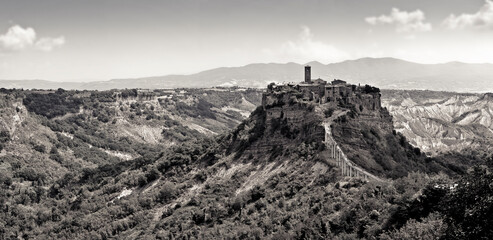 Panoramic view of the famouse medieval citadel of Civita town with the elevated walkway (Italy -...