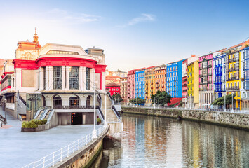 Fototapeta na wymiar Spain - Bilbao old town cityscape on the riverbank at Basque Country - Market and colorful houses.