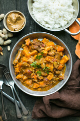 African chicken peanut stew with sweet potatoes  with side of basmati rice