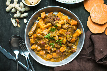 African chicken peanut stew with sweet potatoes  with side of basmati rice