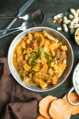 African chicken peanut stew with sweet potatoes  with side of basmati rice