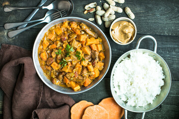 African chicken peanut stew with sweet potatoes  with side of basmati rice