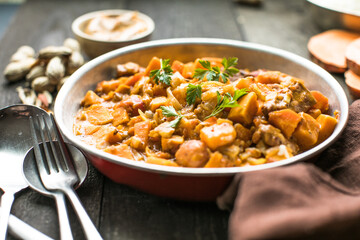 African chicken peanut stew with sweet potatoes  with side of basmati rice - obrazy, fototapety, plakaty