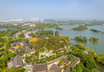 The drone aerial view of Jinshan Temple park. Jinshan Templeis a Buddhist temple located in Runzhou District of Zhenjiang, Jiangsu, China. 