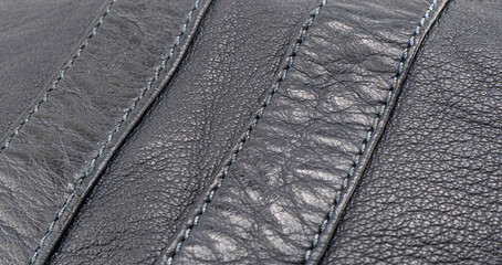 Macro shot leather texture background. Part of perforated leather details. Perforated leather...