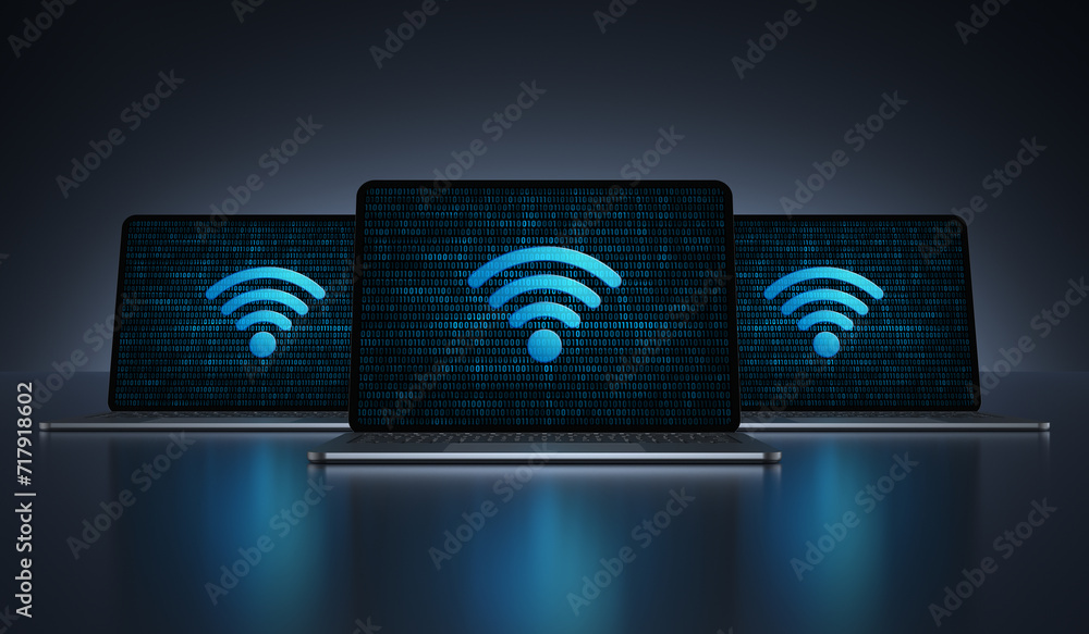 Poster laptop devices with wi-fi internet icon on their screens on a dark background. realistic rendering.