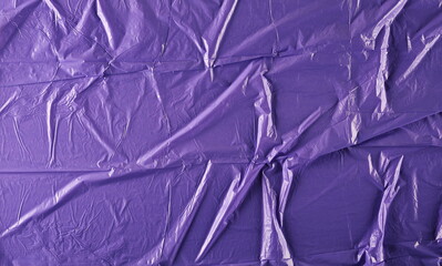 Lilac plastic wrinkled bag texture and background	