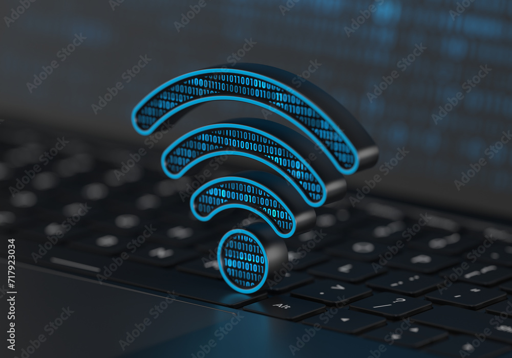 Poster a digital wi-fi internet icon placed on a laptop keyboard in semi-side view with soft depth of field