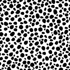Organic dots seamless pattern. Pebble shaped elements repeated on white background. Creative art texture for printing on various surfaces or usage in graphic design projects.