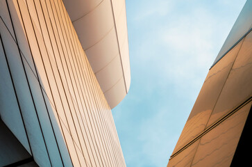 walls of a modern building against a blue sky