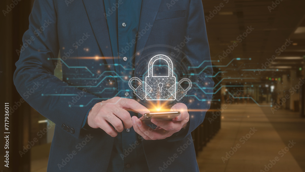 Poster businessman using smart mobile phone with padlock icon and blurred background in concept of cybersec