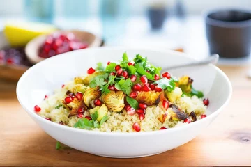 Fototapeten quinoa and roasted brussels sprouts bowl with pomegranate seeds © primopiano