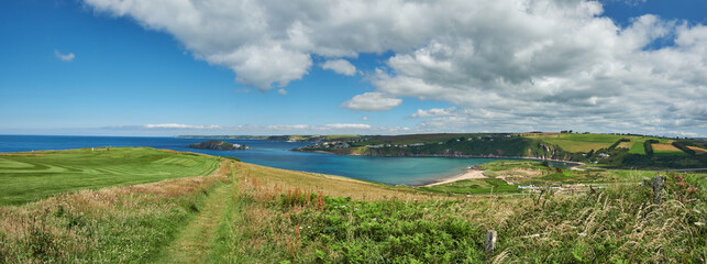 Panorama of Bantham Sand looking towards Burgh Island and Bigbury-on-Sea, from the South West Coast Path, Devon, UK