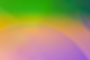 Abstract blurred background image of green, yellow, pink colors gradient used as an illustration. Designing posters or advertisements.