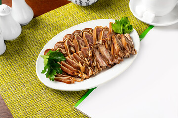 Marinated pig ears, appetizer.