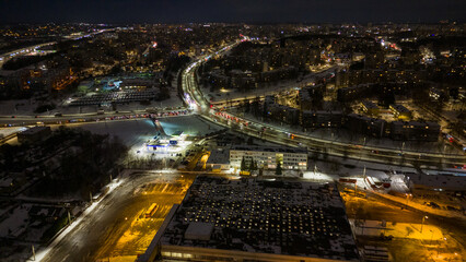 Fototapeta na wymiar Drone photography of high intensity road in a city during winter morning rush