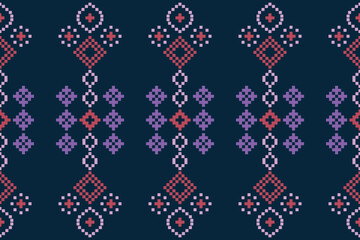Ethnic geometric fabric pattern Cross Stitch.Ikat embroidery Ethnic oriental Pixel pattern navy blue background. Abstract,vector,illustration. Texture,clothing,scarf,decoration,motifs,silk wallpaper.