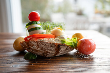 Healthy easter snack with natural ingredients on wooden table. Close-up with short depth of field.