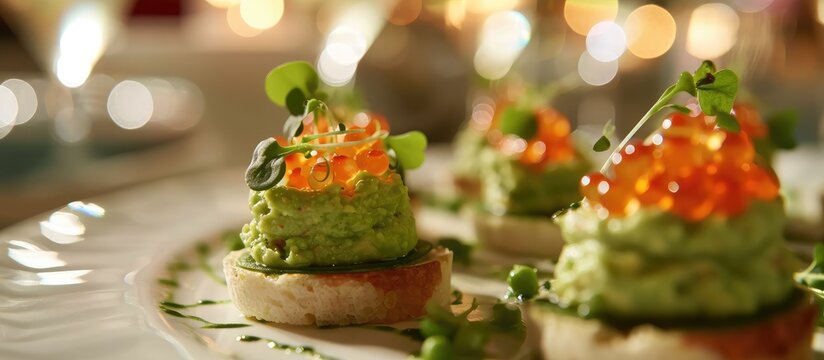 At the grand dinner, guests were delighted by the exquisite presentation of the festive appetizer, featuring a creamy avocado and pea puree elegantly topped with vibrant red caviar.