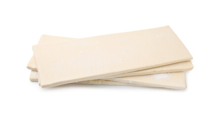 Raw puff pastry dough isolated on white