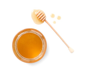 Tasty honey in glass jar and dipper isolated on white, top view