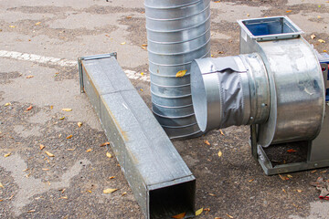 impeller of an industrial radial fan in an exhaust system and air ducts close-up