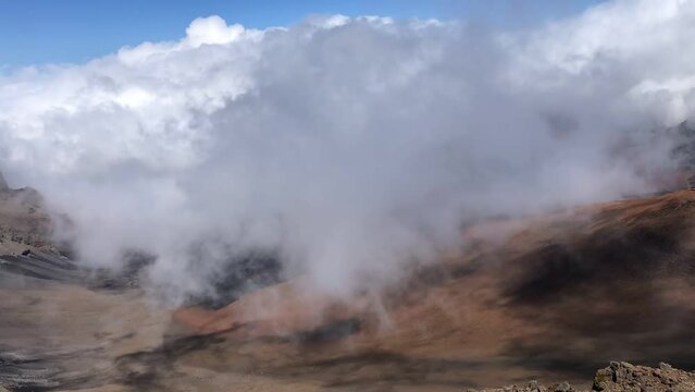 Time lapse of clouds gracefully enveloping Haleakala crater.