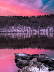 Vibrant Sunrise over Mountain and water reflection on Lake Zoar in Monroe, Connecticut, tranquil...