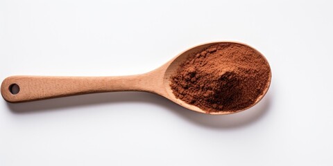 Coriander Ground Pile In Wooden Spoon. Organic Seasoning On White Background. Top View Of Aroma Spice. Brown Condiment, Cooking Powder